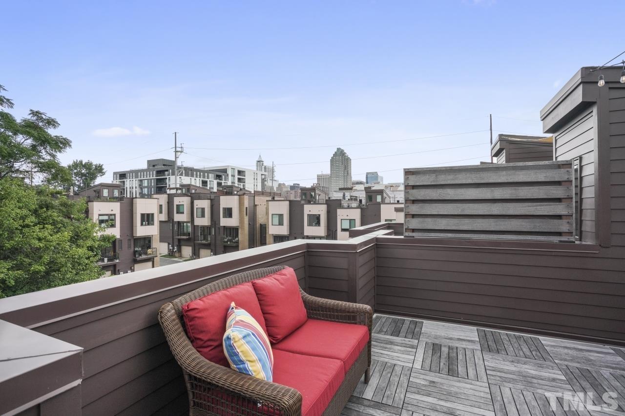 514 West South Street Raleigh, NC 27601 - Photo 30 of 41 a view of roof deck with seating space and city view