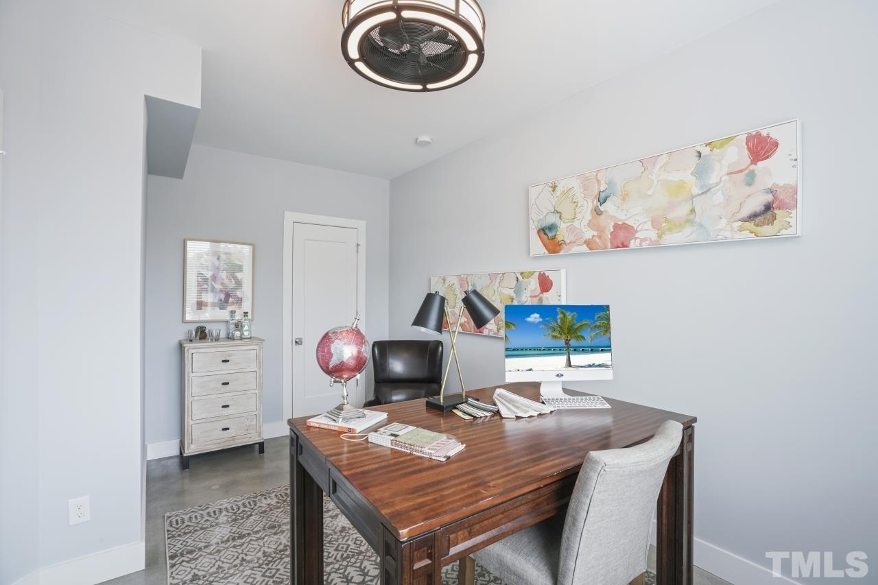 514 West South Street Raleigh, NC 27601 - Photo 7 of 41 a view of a workspace with furniture
