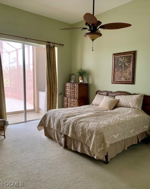 9053 Prosperity Way Fort Myers, FL 33913 - Photo 11 of 27 a spacious bedroom with a bed and a window