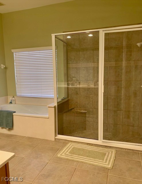 9053 Prosperity Way Fort Myers, FL 33913 - Photo 14 of 27 a bathroom with a shower and a sink
