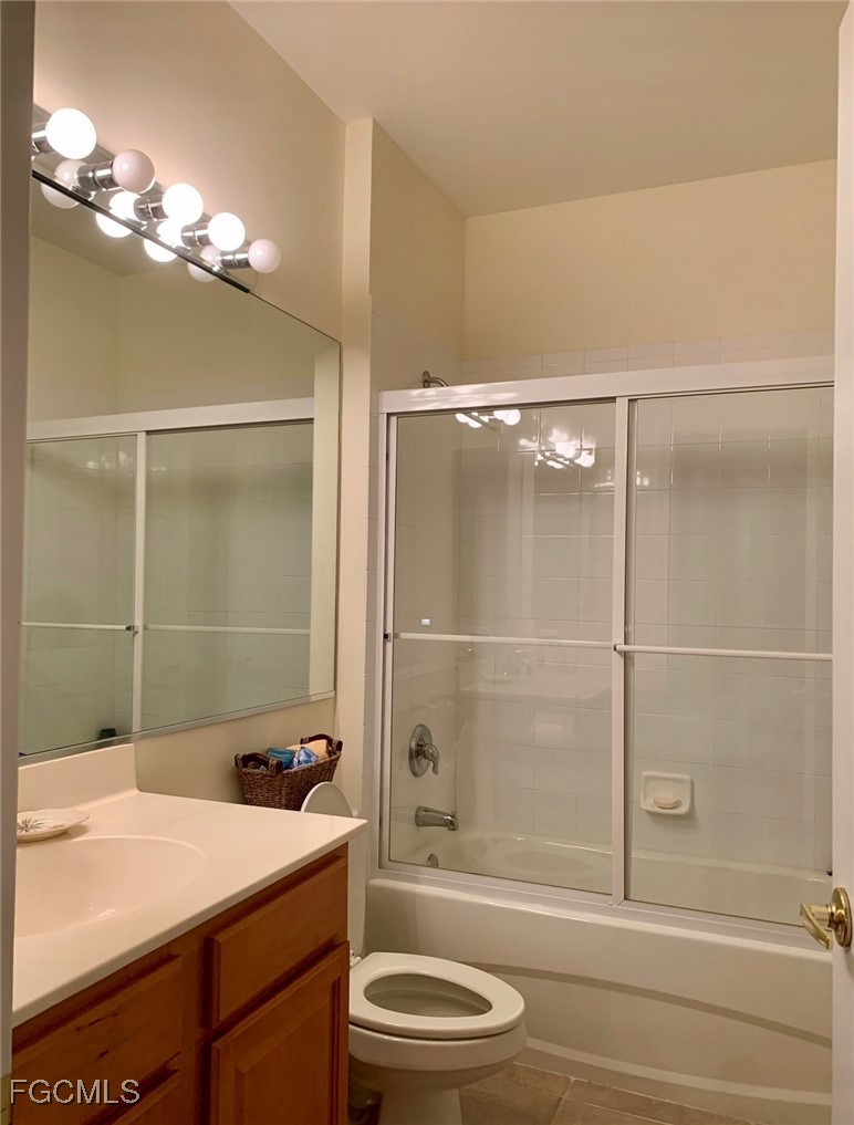 9053 Prosperity Way Fort Myers, FL 33913 - Photo 18 of 27 a bathroom with a shower a toilet and sink