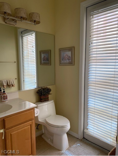 9053 Prosperity Way Fort Myers, FL 33913 - Photo 19 of 27 a bathroom with a sink a toilet and shower