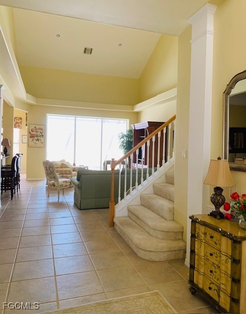 9053 Prosperity Way Fort Myers, FL 33913 - Photo 2 of 27 a living room with furniture and a flat screen tv