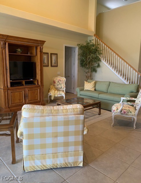 9053 Prosperity Way Fort Myers, FL 33913 - Photo 5 of 27 a living room with furniture and a flat screen tv
