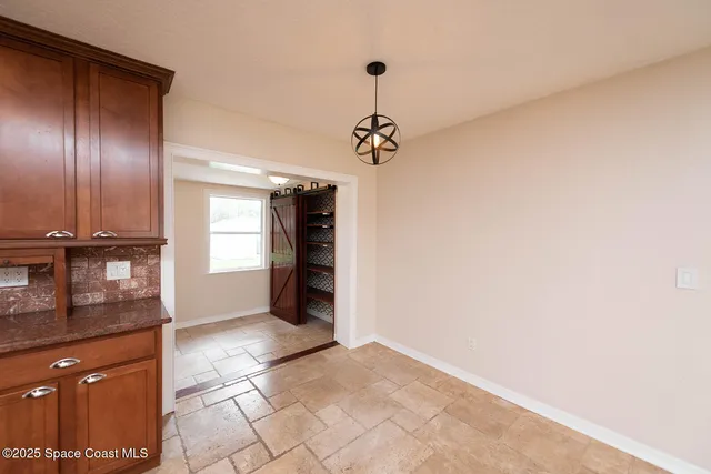 a view of a kitchen with a sink