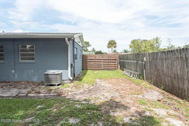a house view with a backyard