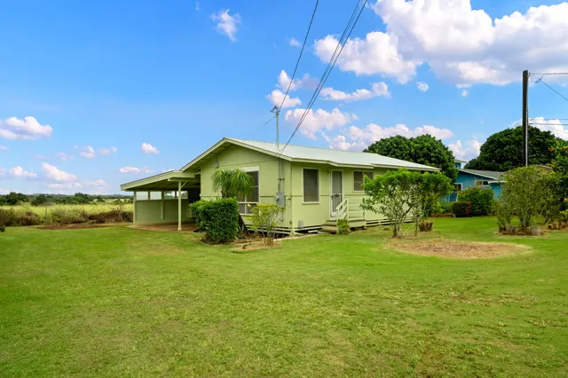 a view of a house with a big yard