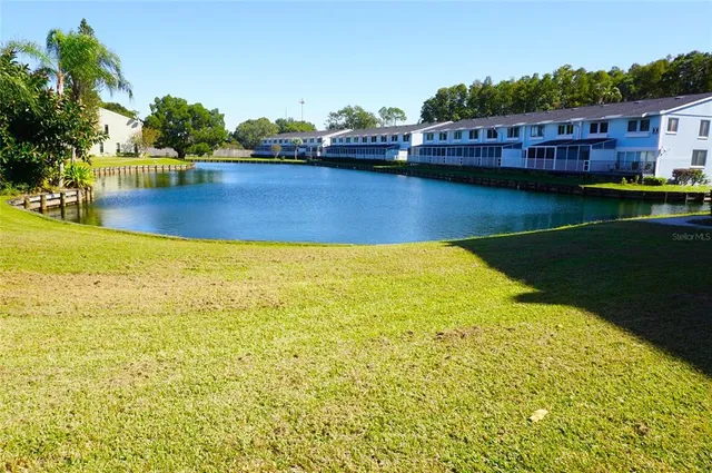 a view of a lake with a house