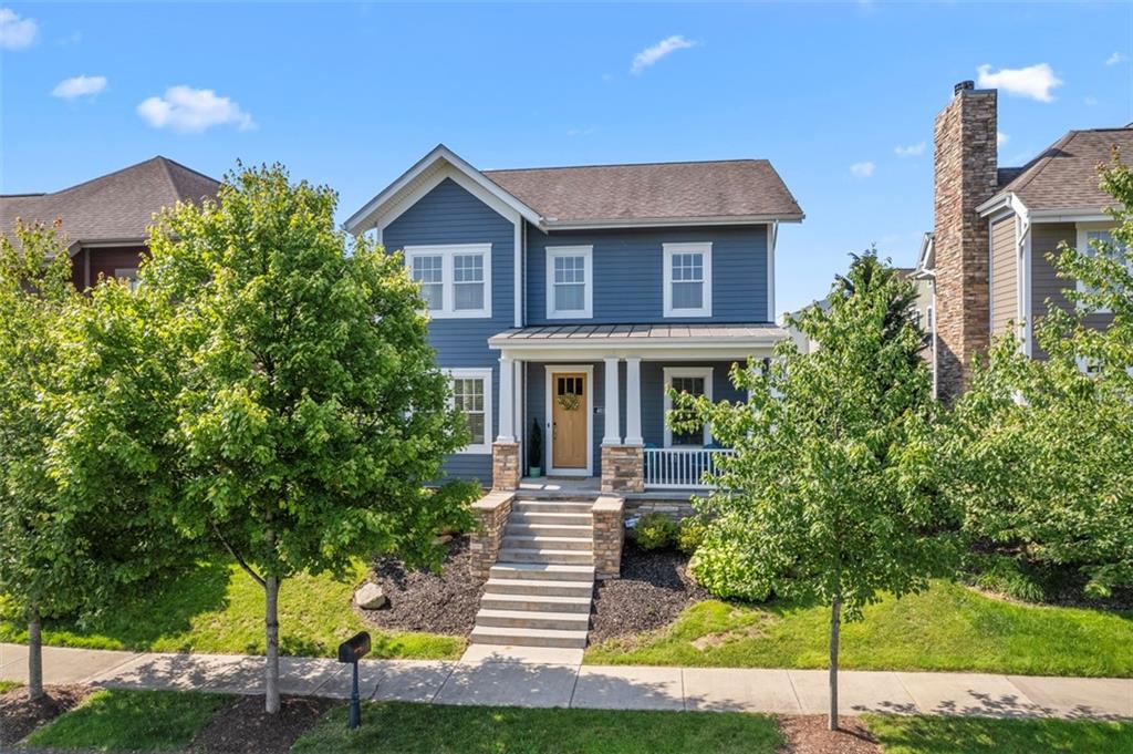 403 Cayuga Circle Mars, PA 16046 - Photo 1 of 50 a front view of a house with garden