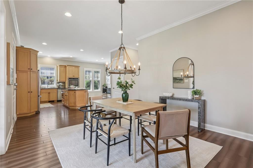 403 Cayuga Circle Mars, PA 16046 - Photo 19 of 50 a dining room with furniture a chandelier and wooden floor