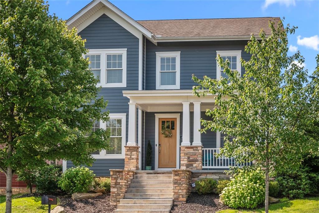 403 Cayuga Circle Mars, PA 16046 - Photo 2 of 50 a front view of a house with a garden