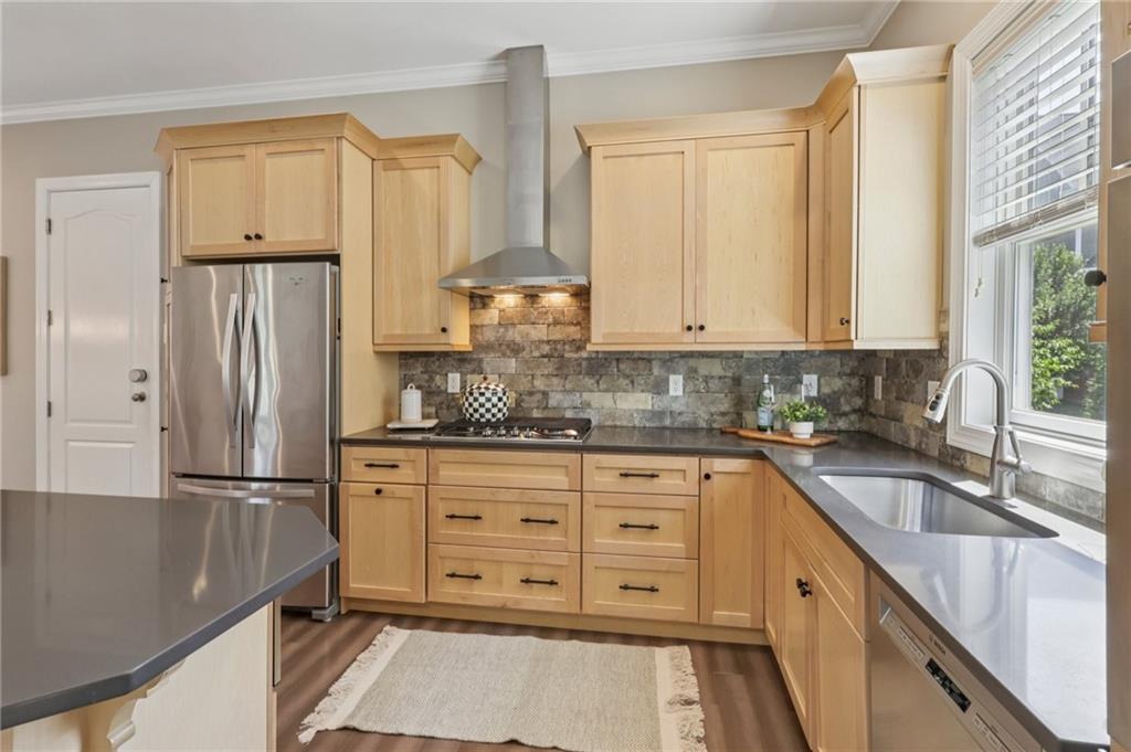 403 Cayuga Circle Mars, PA 16046 - Photo 22 of 50 a kitchen with granite countertop a refrigerator sink and cabinets