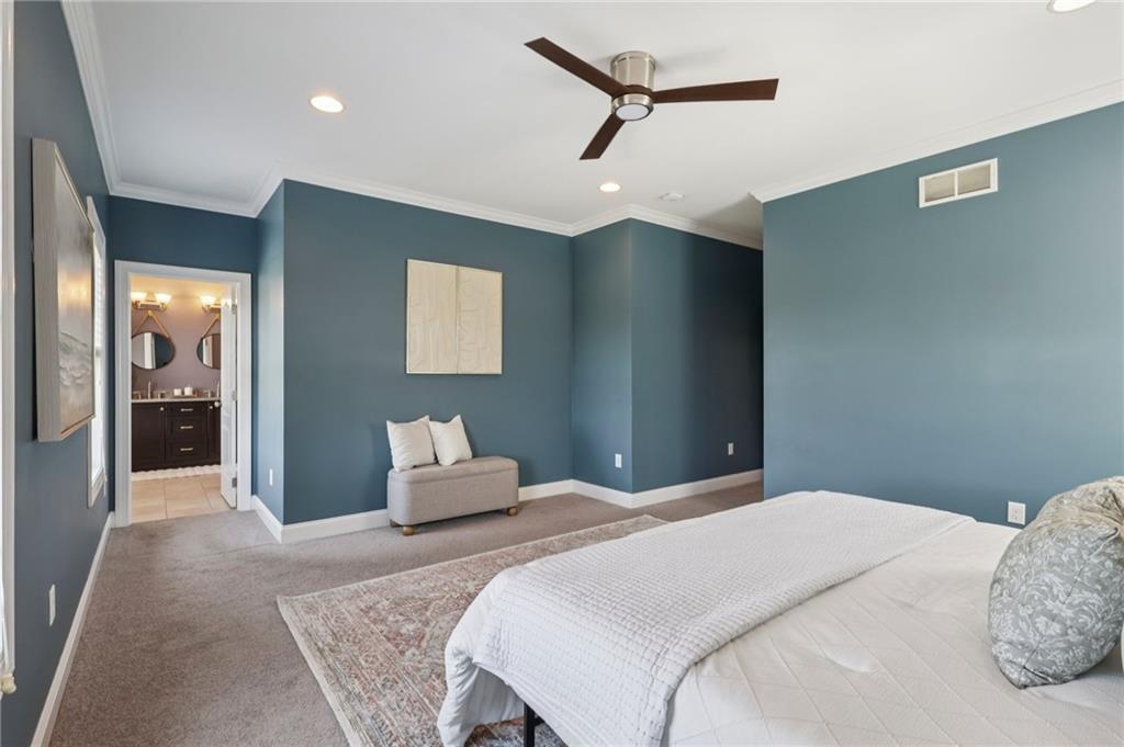 403 Cayuga Circle Mars, PA 16046 - Photo 28 of 50 a bedroom with a large bed and walk in closet