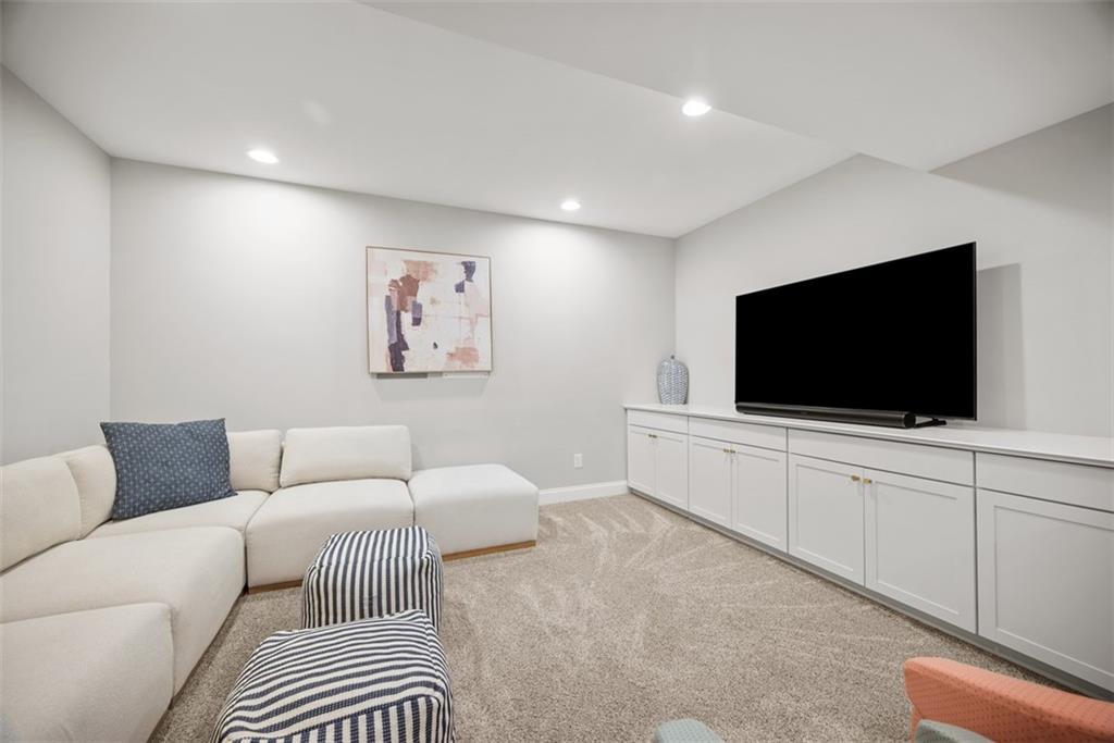 403 Cayuga Circle Mars, PA 16046 - Photo 40 of 50 a living room with furniture and a flat screen tv