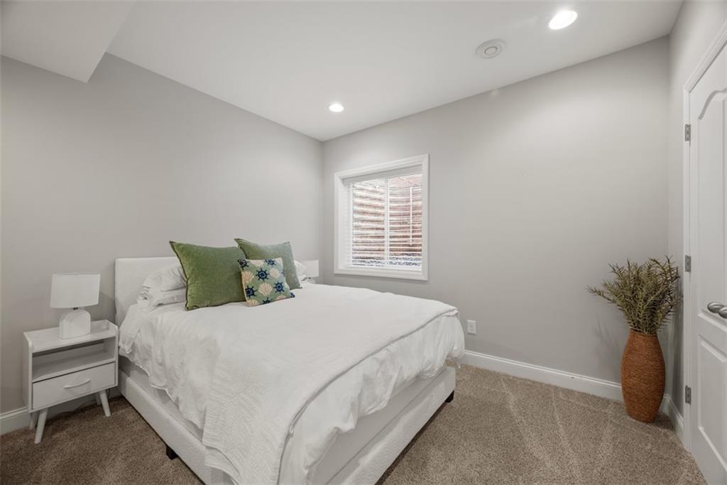 403 Cayuga Circle Mars, PA 16046 - Photo 44 of 50 a bedroom with a bed and a potted plant