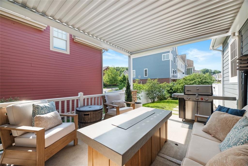 403 Cayuga Circle Mars, PA 16046 - Photo 47 of 50 a view of a patio with couches table and chairs and potted plants