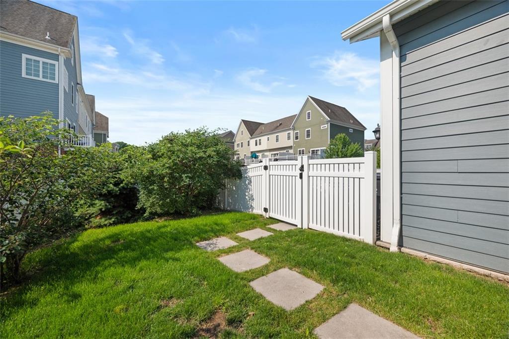 403 Cayuga Circle Mars, PA 16046 - Photo 48 of 50 a view of a wooden house with a small yard and wooden fence
