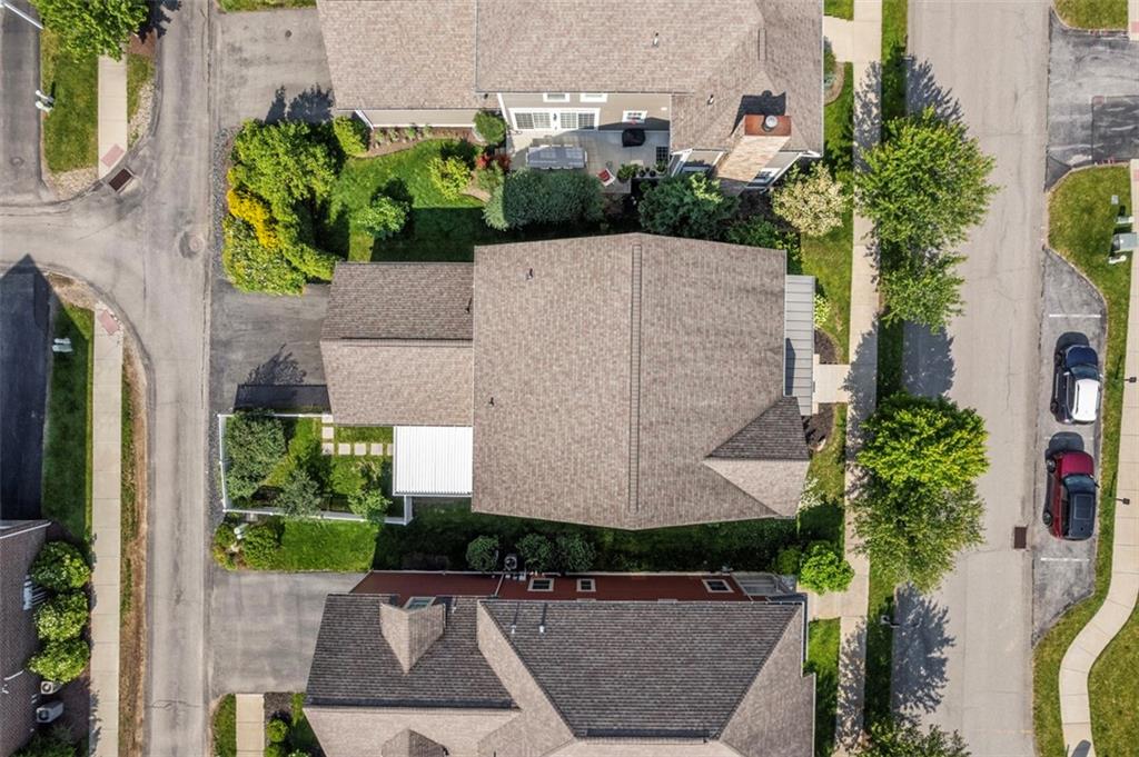 403 Cayuga Circle Mars, PA 16046 - Photo 5 of 50 an aerial view of a house with a yard and potted plants