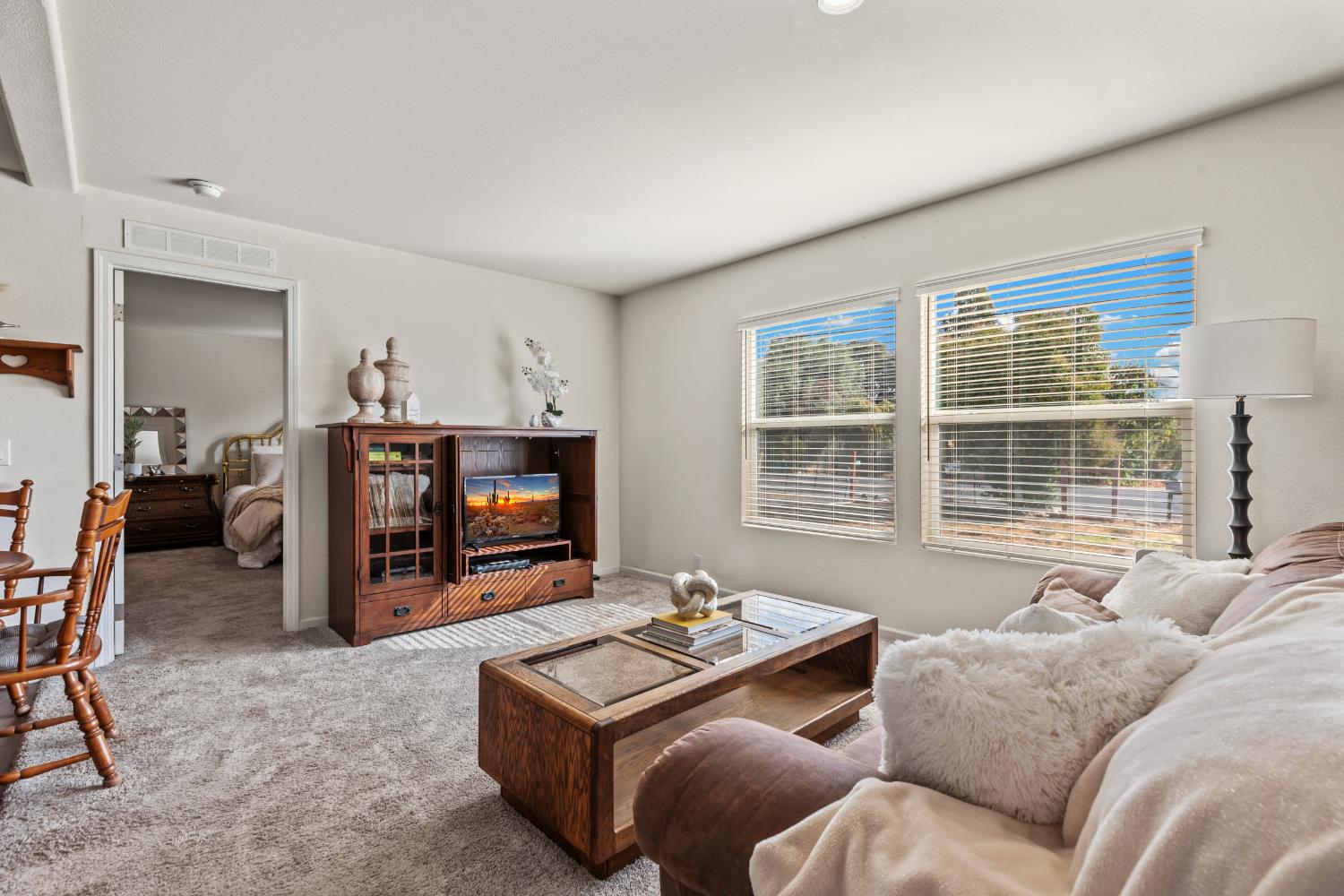 16120 Jacksonville Road Jamestown, CA 95327 - Photo 11 of 30 a living room with furniture and a flat screen tv