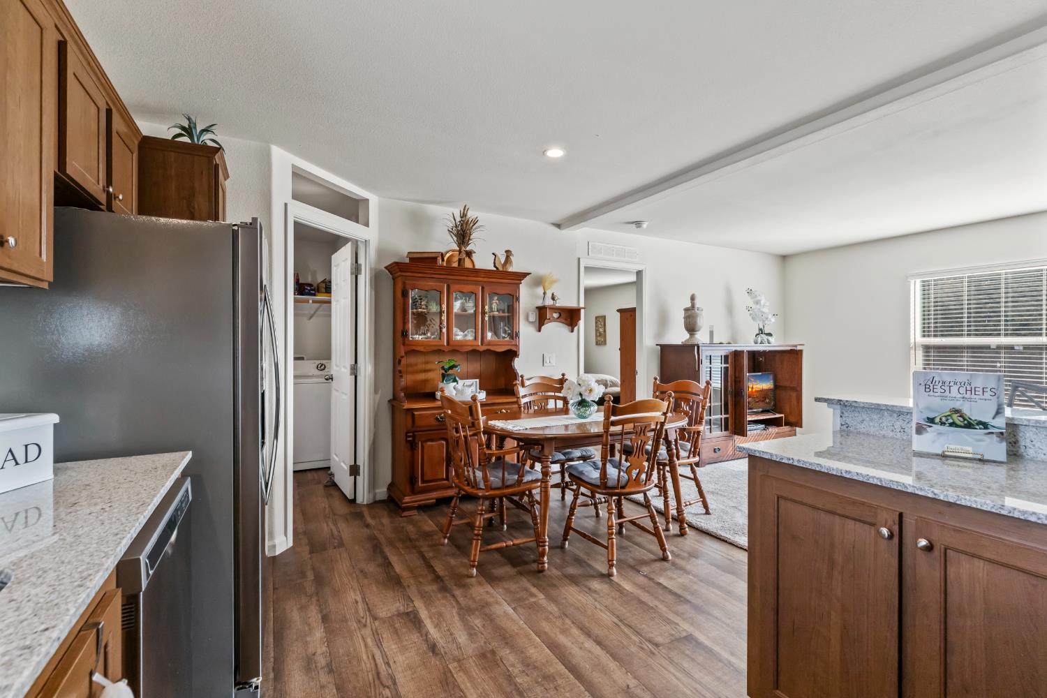 16120 Jacksonville Road Jamestown, CA 95327 - Photo 14 of 30 a view of a dining room with furniture and wooden floor