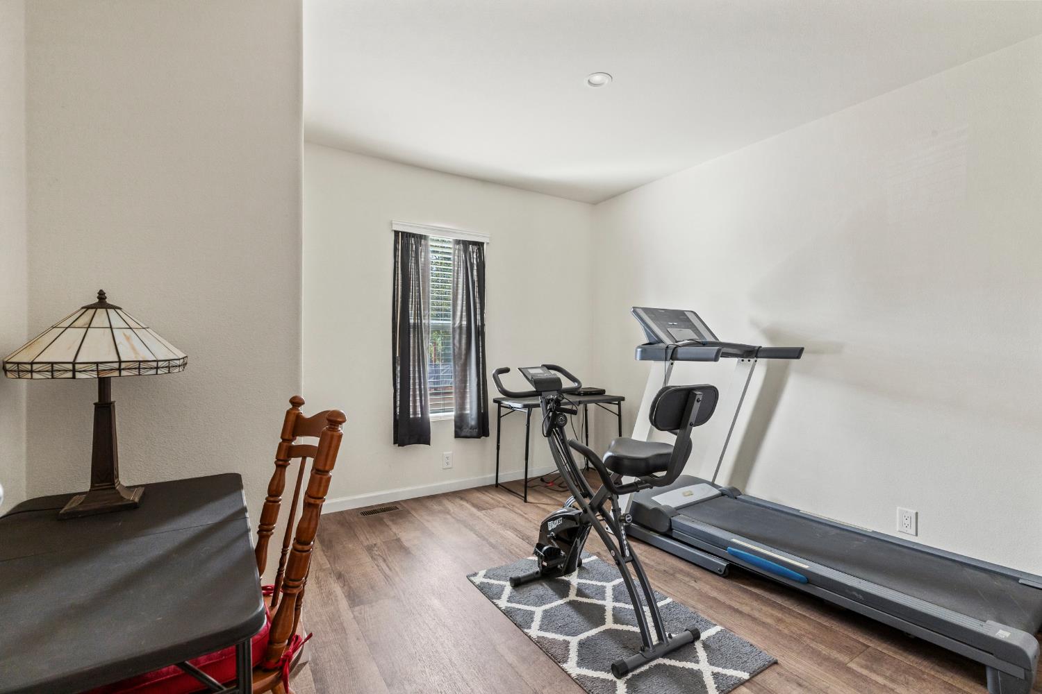16120 Jacksonville Road Jamestown, CA 95327 - Photo 17 of 30 a view of a workspace with furniture and wooden floor