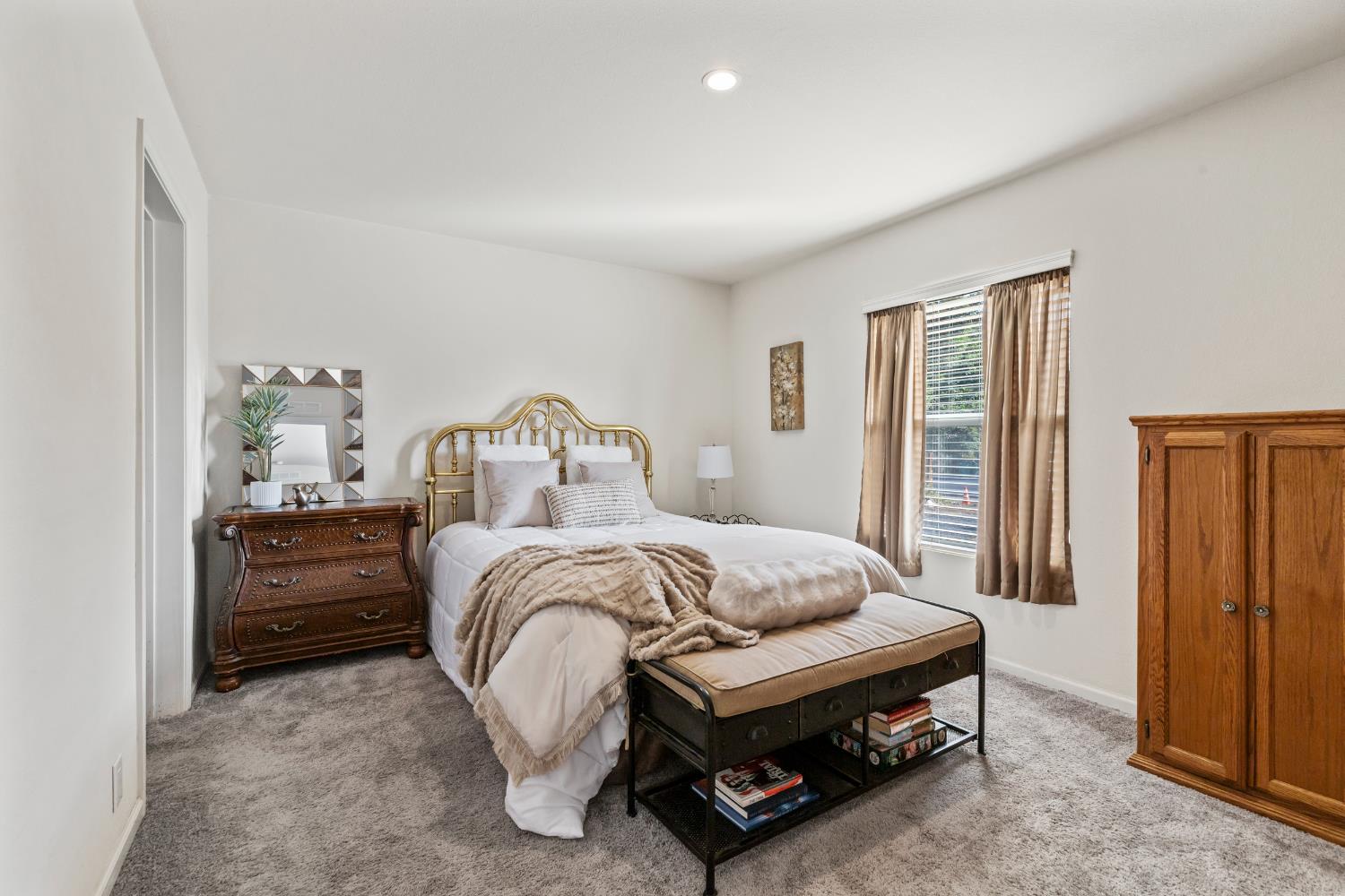 16120 Jacksonville Road Jamestown, CA 95327 - Photo 19 of 30 a bedroom with a bed and a window