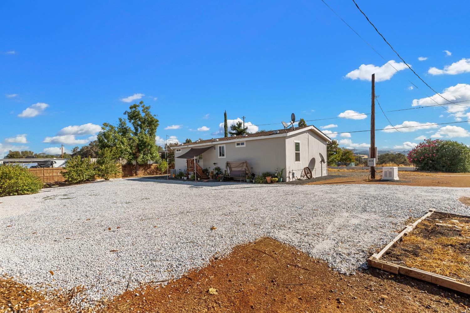 16120 Jacksonville Road Jamestown, CA 95327 - Photo 24 of 30 a view of a house with a patio