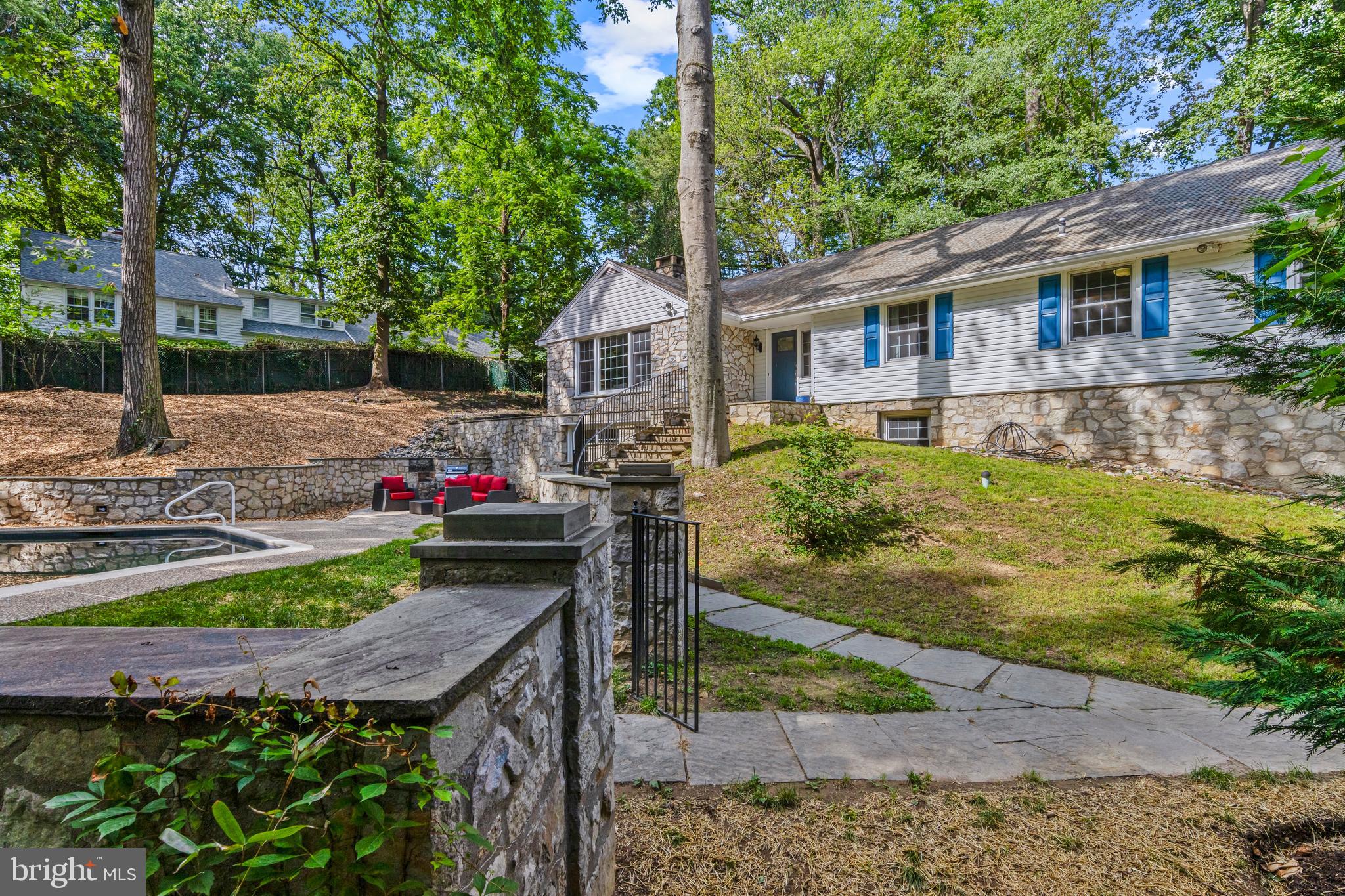 13 Weirwood Road Wayne, PA 19087 - Photo 2 of 61 a front view of a house with garden