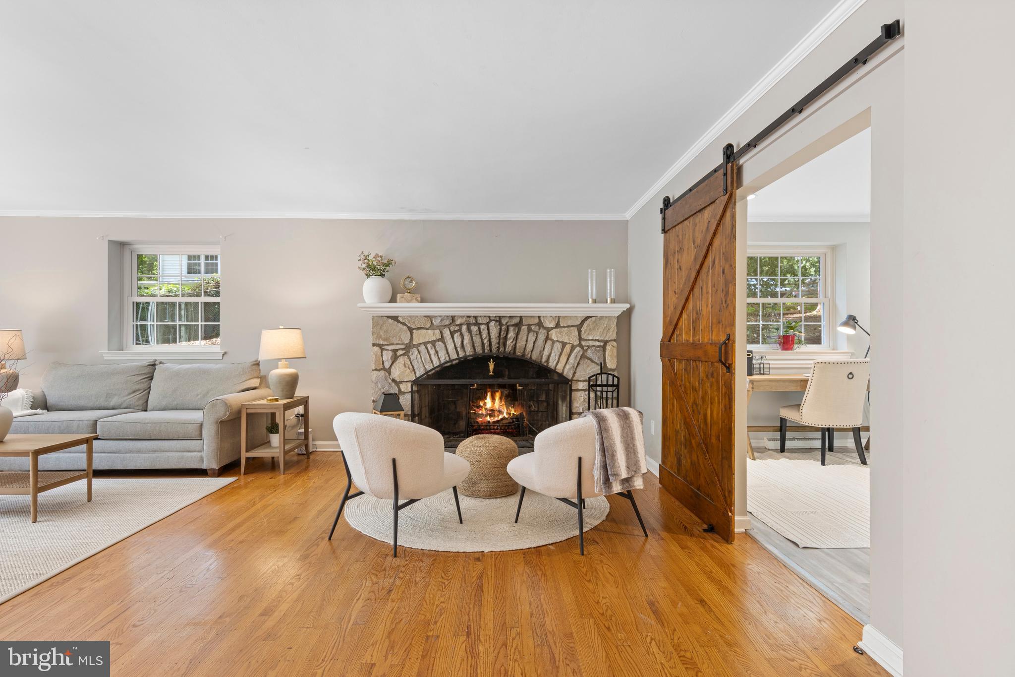 13 Weirwood Road Wayne, PA 19087 - Photo 7 of 61 a living room with furniture and a fireplace