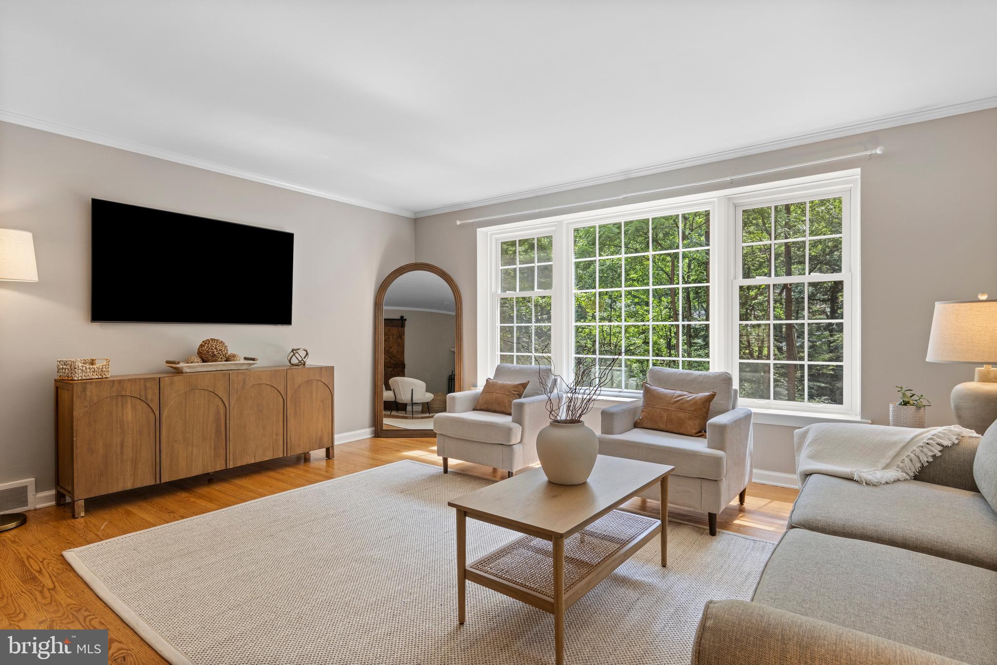 13 Weirwood Road Wayne, PA 19087 - Photo 10 of 61 a living room with furniture and a flat screen tv