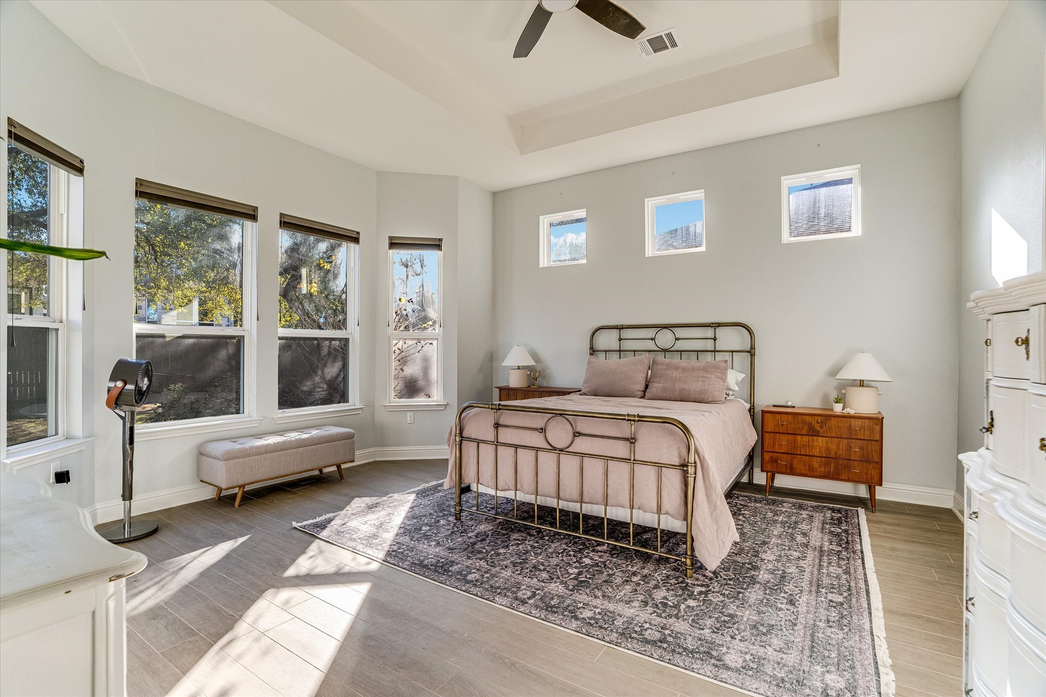 5205 Mandevilla Drive Austin, TX 78739 - Photo 12 of 20 a bedroom with a bed and a couch