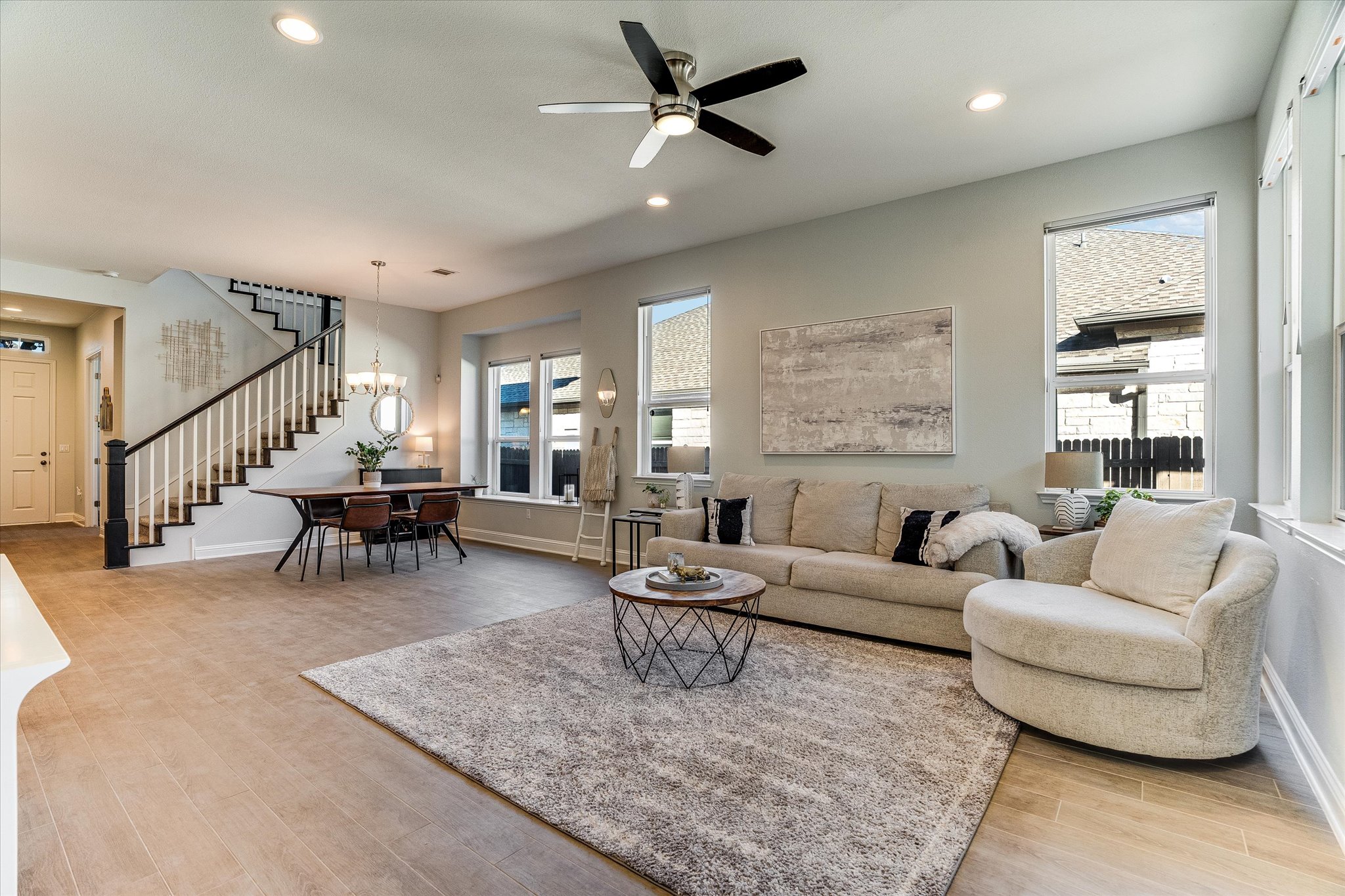 5205 Mandevilla Drive Austin, TX 78739 - Photo 3 of 20 a living room with furniture and a large window
