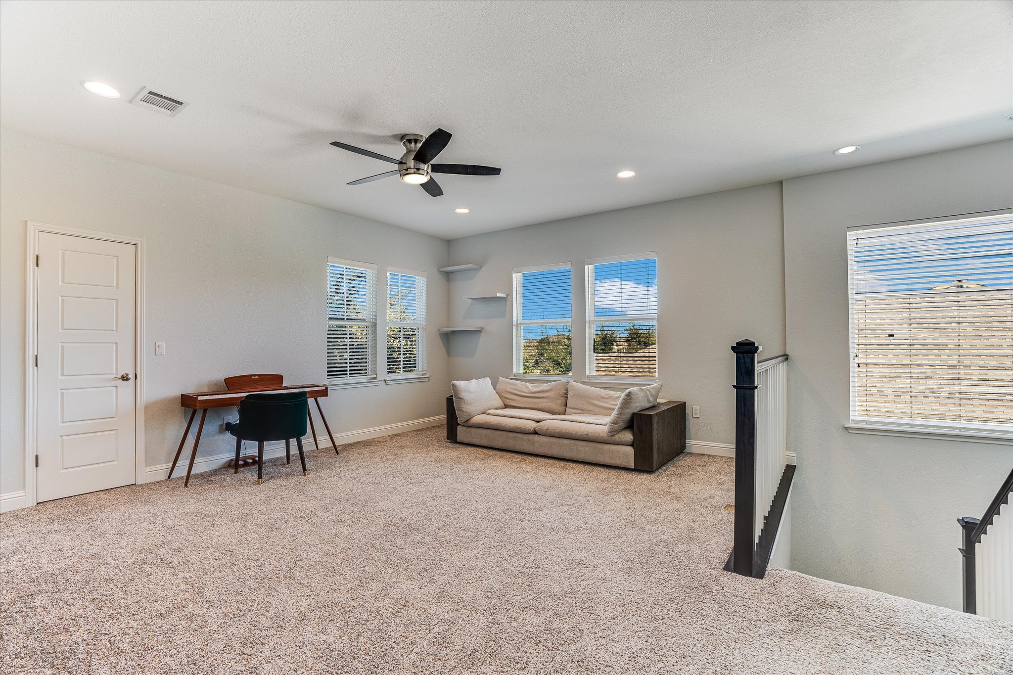 5205 Mandevilla Drive Austin, TX 78739 - Photo 5 of 20 a living room with furniture and a window