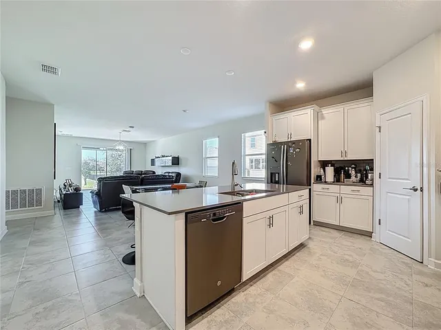 a kitchen with a stove and a microwave