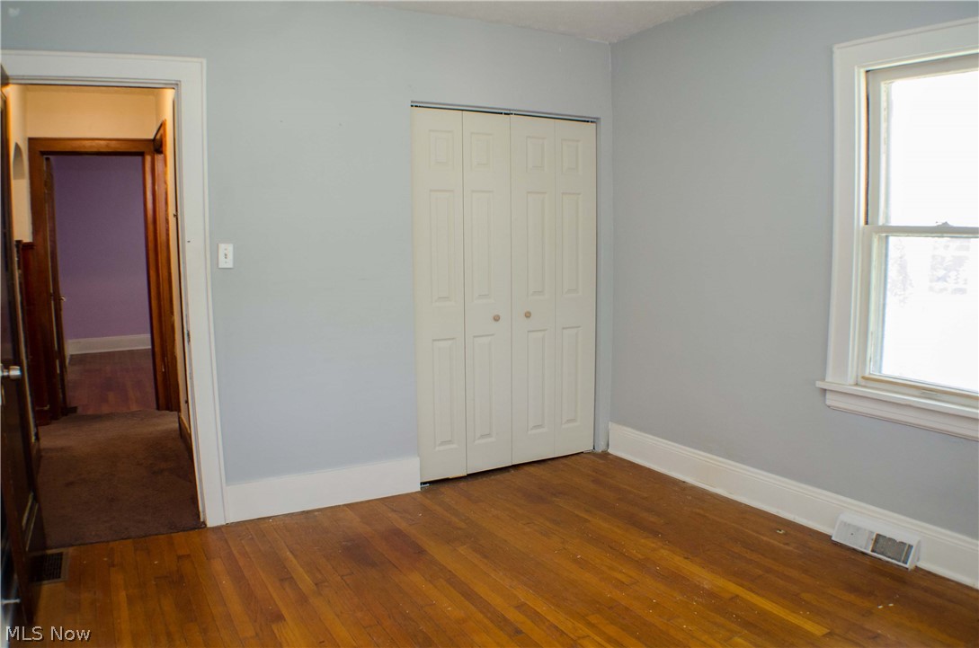 2324 Mogadore Road Akron, OH 44312 - Photo 16 of 26 Master bedroom with update bi-fold door on the closet allowing access to the entire with of closet