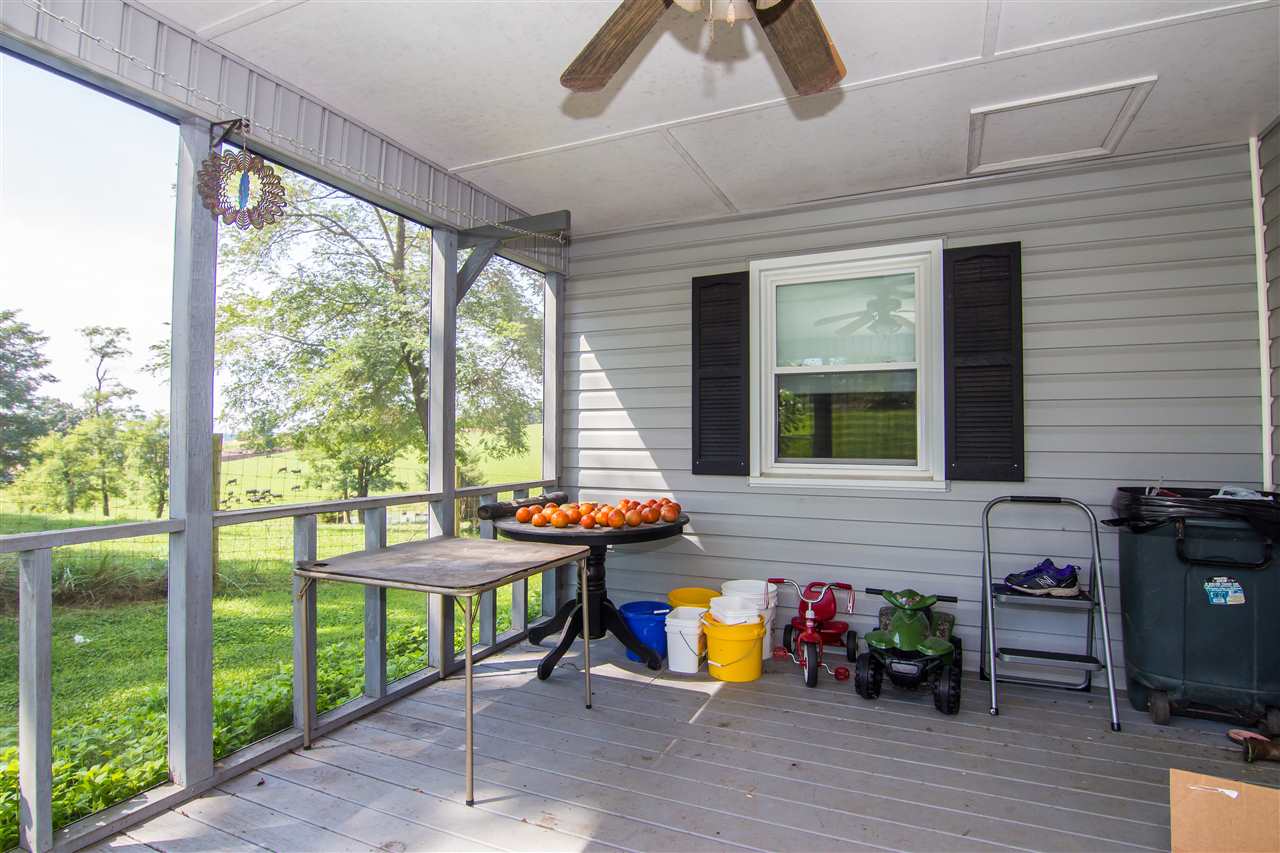 4357 Martin Miller Road Dayton, VA 22821 - Photo 20 of 28 a balcony with furniture and wooden floor
