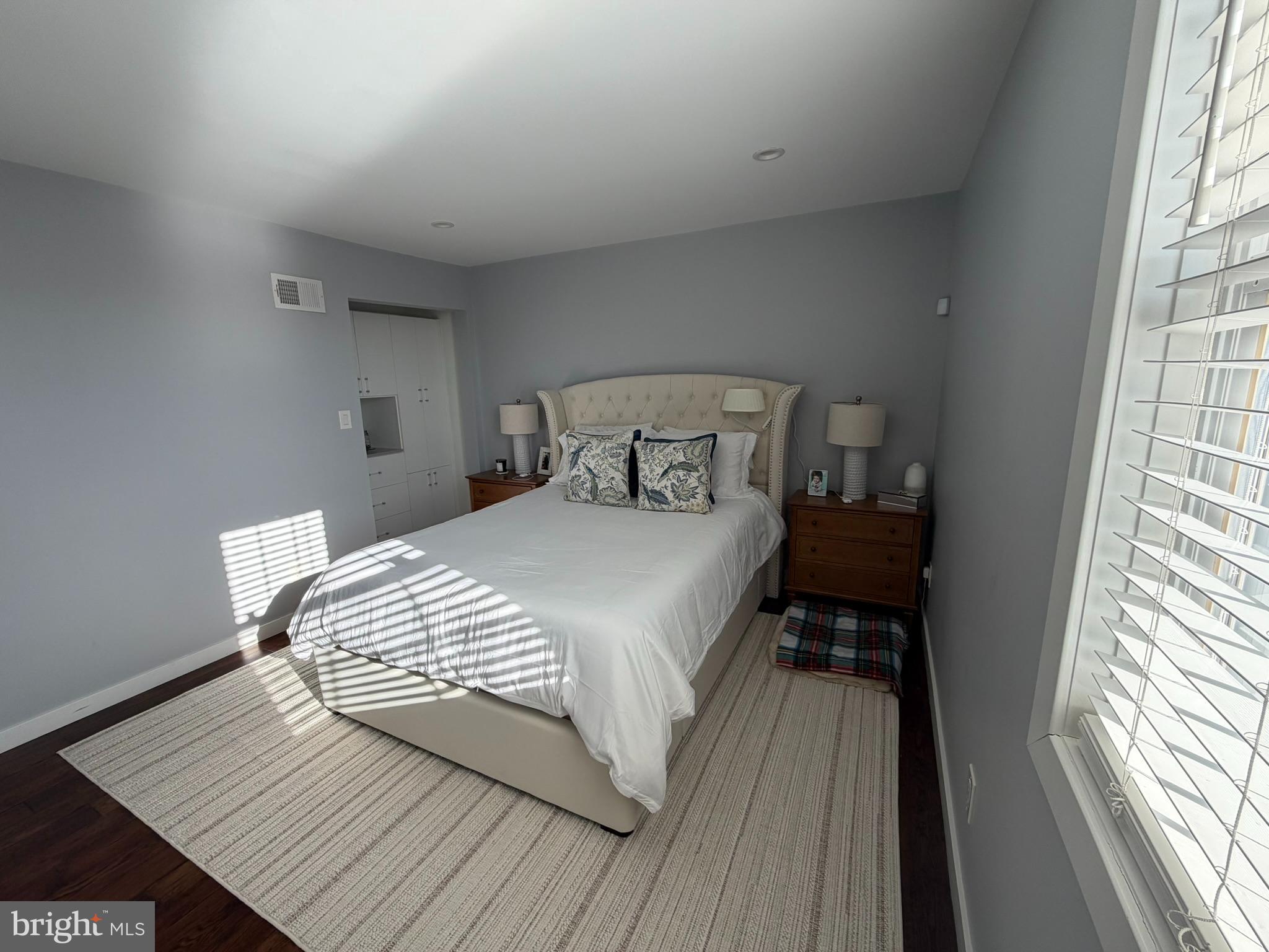 8101 Large Street Philadelphia, PA 19152 - Photo 17 of 30 a bedroom with a bed and wooden floor