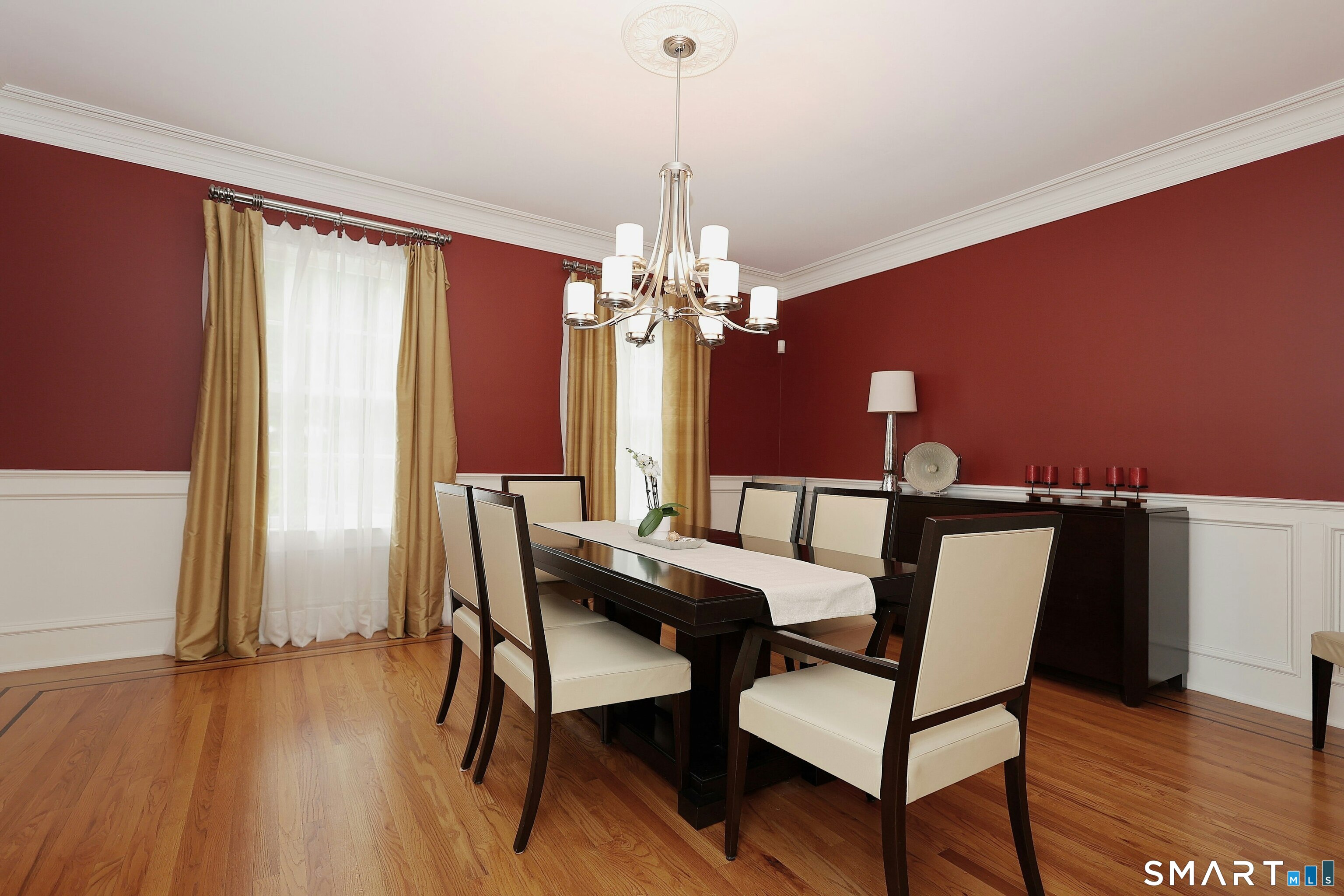 30 Whipstick Road Ridgefield, CT 06877 - Photo 23 of 40 a view of a dining room with furniture and wooden floor