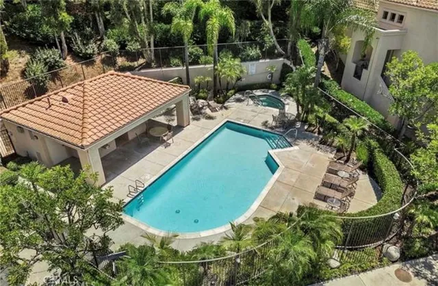 a view of a backyard with sitting area