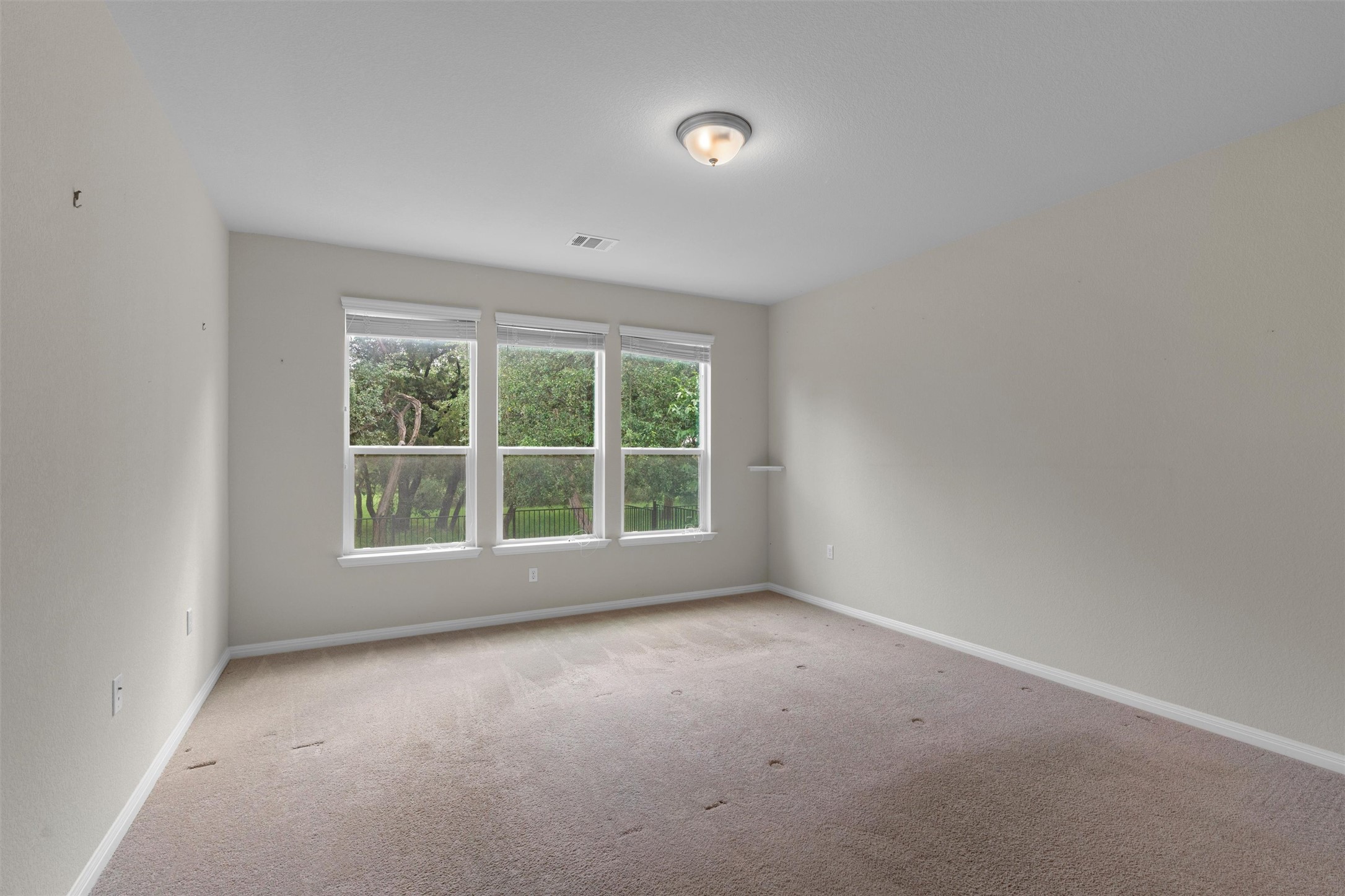 108 Calhoun Lane Georgetown, TX 78633 - Photo 16 of 32 an empty room with a window