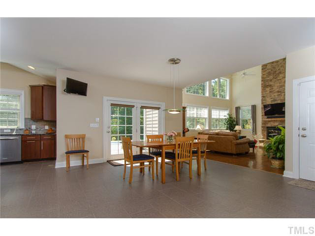 200 Swift Creek Crossing Durham, NC 27713 - Photo 11 of 25 a living room with furniture and a large window