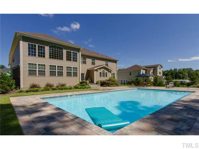 200 Swift Creek Crossing Durham, NC 27713 - Photo 21 of 25 a view of swimming pool with lawn chairs and a yard