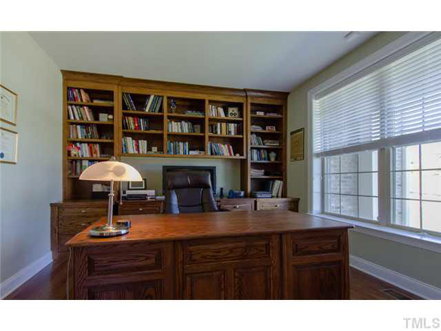 200 Swift Creek Crossing Durham, NC 27713 - Photo 5 of 25 a kitchen with a table and a potted plant