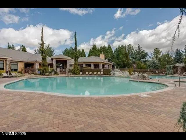 900 South Meadows Parkway, Unit 2012 Reno, NV 89521 - Photo 2 of 3 a view of a house with a swimming pool
