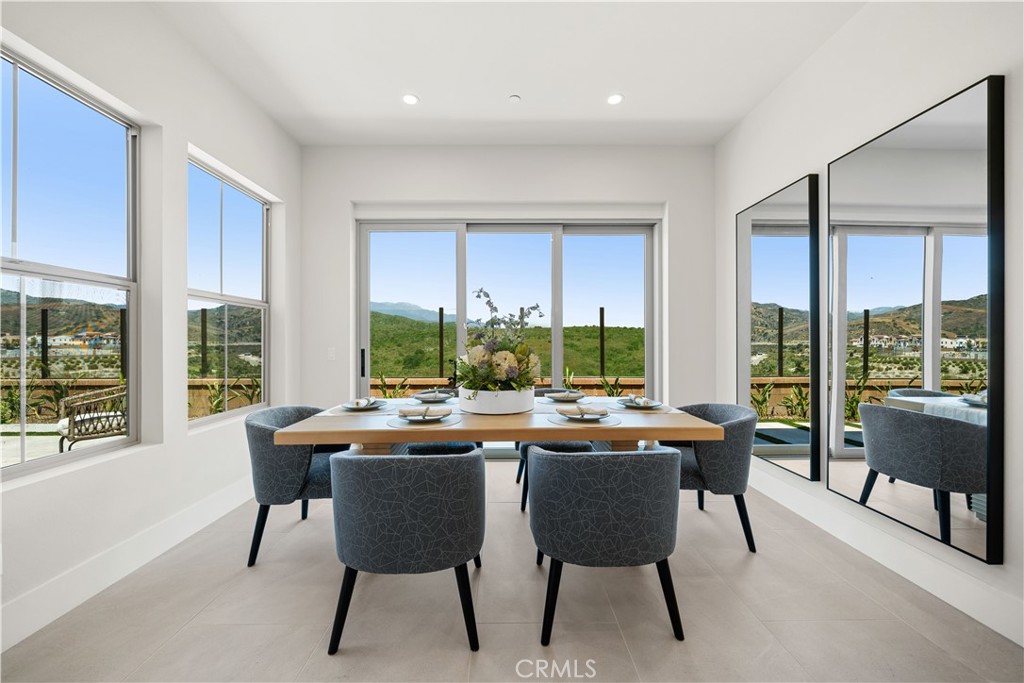 122 Mossvine Irvine, CA 92618 - Photo 12 of 44 a view of a dining room with furniture window and outdoor space