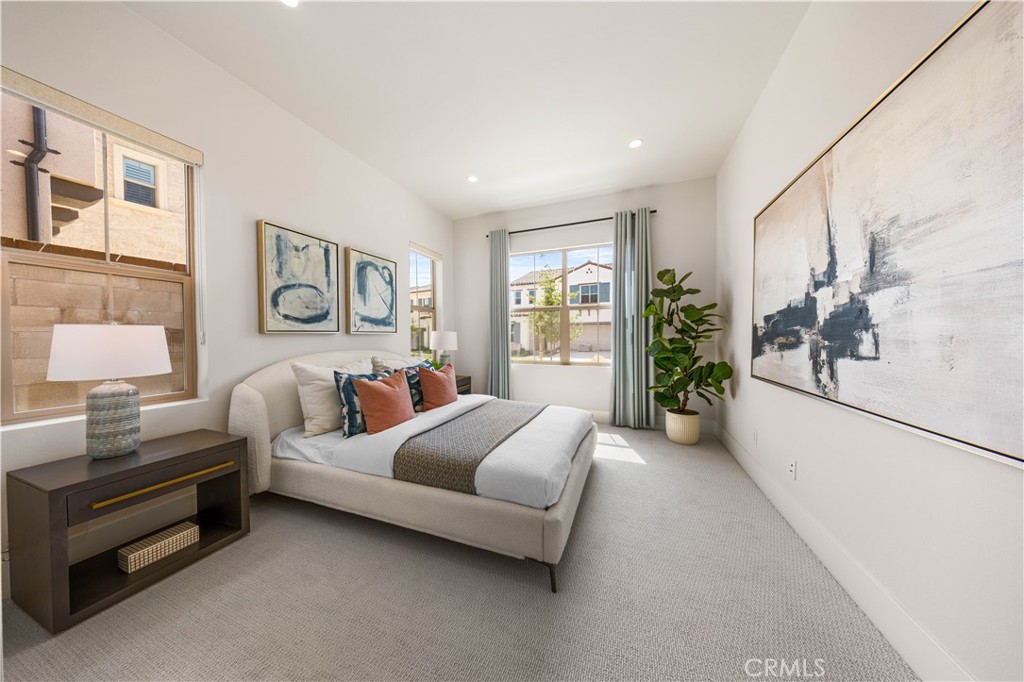 122 Mossvine Irvine, CA 92618 - Photo 15 of 44 a living room with furniture and a window