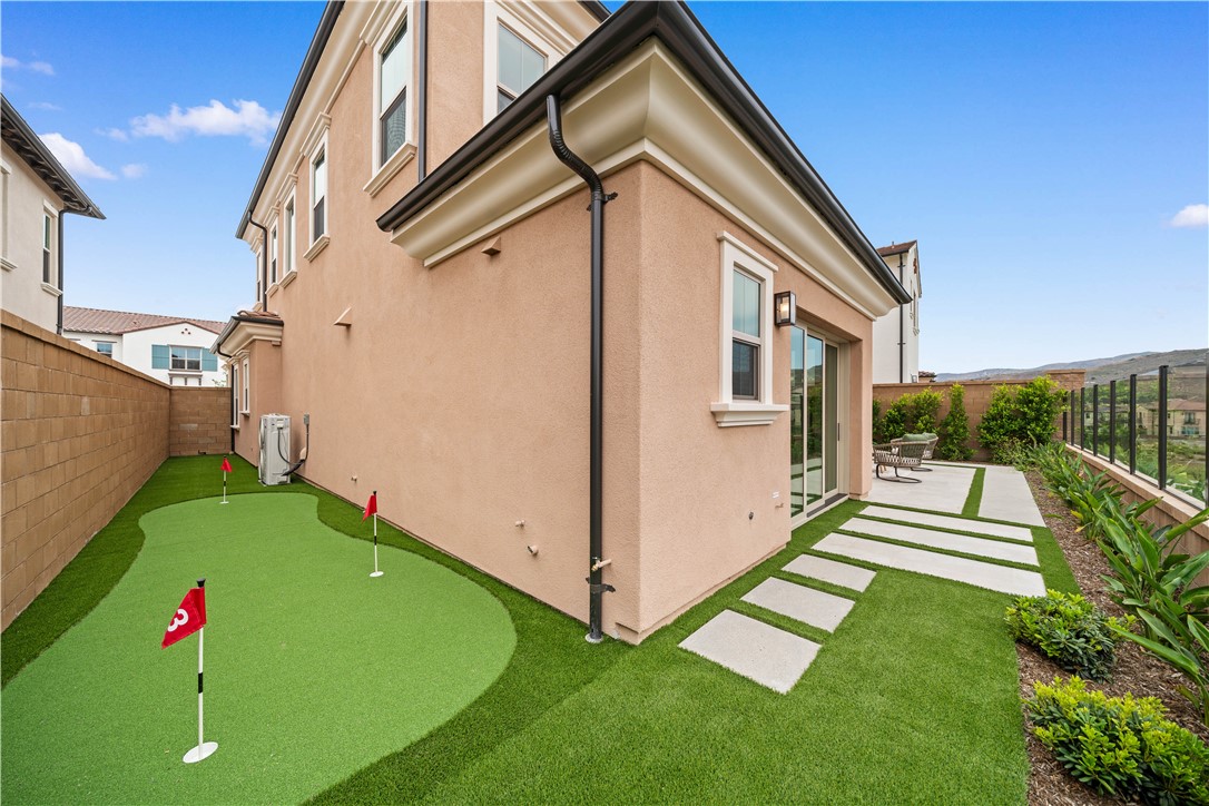 122 Mossvine Irvine, CA 92618 - Photo 21 of 44 a view of backyard with deck and garden