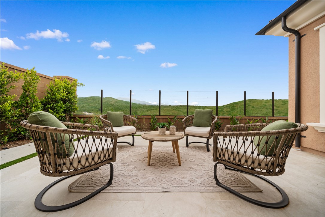 122 Mossvine Irvine, CA 92618 - Photo 22 of 44 a view of a chairs and table in patio