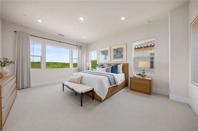 a bed room with a bed and a couch