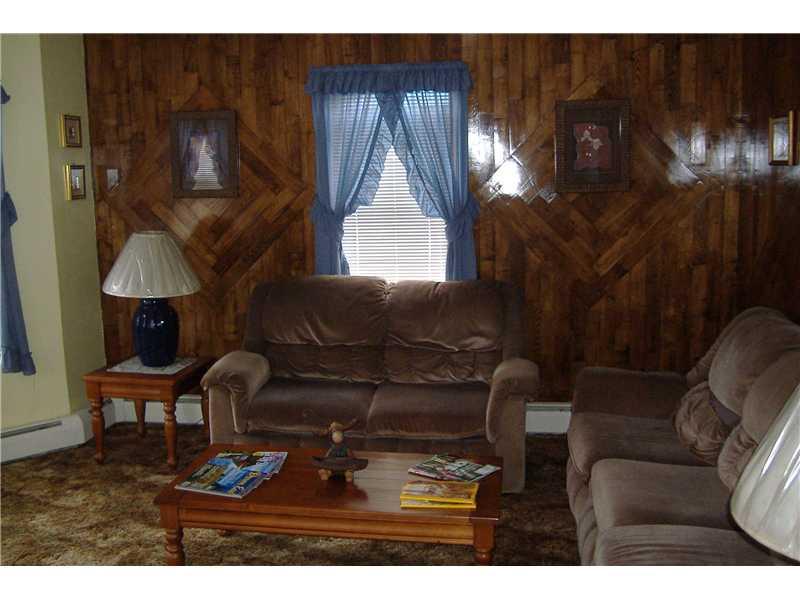 49 Spruce Street Millinocket, ME 04462 - Photo 11 of 14 Living Room.
